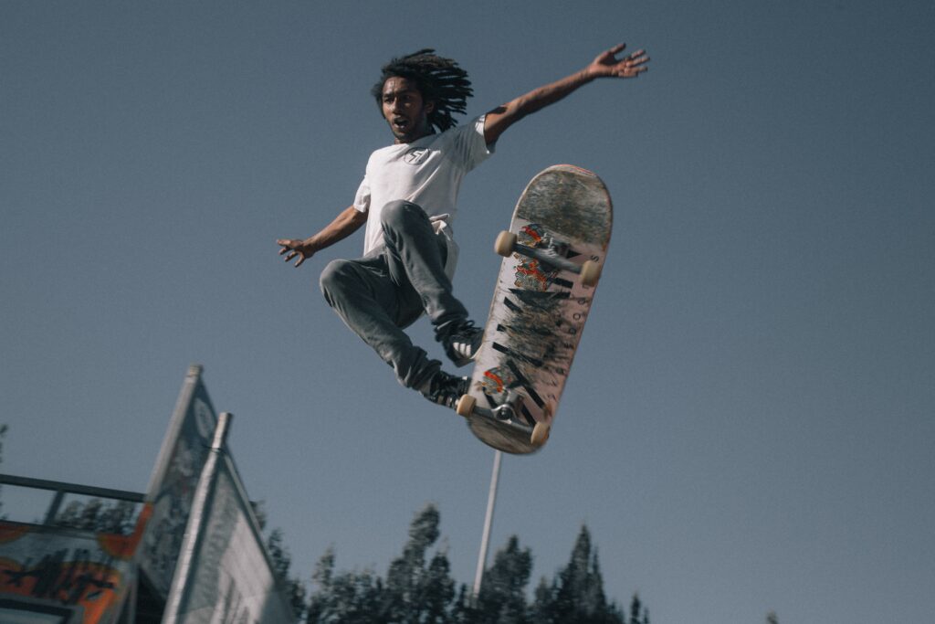 African-American young male skateboarding aerial shot